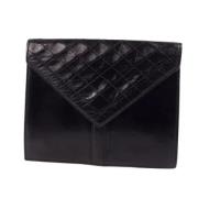 Pre-owned Leather clutches Yves Saint Laurent Vintage , Black , Dames