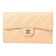 Pre-owned Leather wallets Chanel Vintage , Beige , Dames