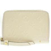 Pre-owned Leather wallets Louis Vuitton Vintage , Beige , Dames