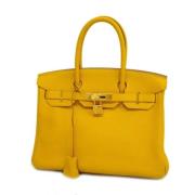 Pre-owned Leather handbags Hermès Vintage , Yellow , Dames