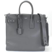 Pre-owned Leather handbags Yves Saint Laurent Vintage , Gray , Dames