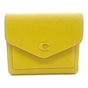 Pre-owned Leather wallets Coach Pre-owned , Yellow , Dames