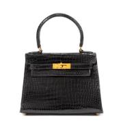 Pre-owned Leather handbags Hermès Vintage , Black , Dames