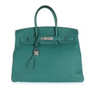 Pre-owned Leather handbags Hermès Vintage , Green , Dames