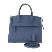 Pre-owned Canvas handbags Louis Vuitton Vintage , Blue , Dames