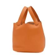 Pre-owned Leather handbags Hermès Vintage , Orange , Dames