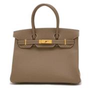 Pre-owned Leather handbags Hermès Vintage , Brown , Dames