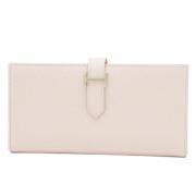 Pre-owned Canvas wallets Hermès Vintage , Beige , Dames