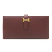 Pre-owned Leather wallets Hermès Vintage , Brown , Dames