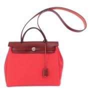 Pre-owned Fabric handbags Hermès Vintage , Red , Dames