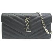 Pre-owned Leather wallets Yves Saint Laurent Vintage , Black , Dames