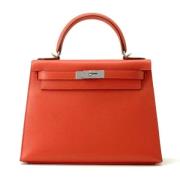 Pre-owned Leather handbags Hermès Vintage , Red , Dames