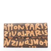 Pre-owned Canvas wallets Louis Vuitton Vintage , Orange , Dames