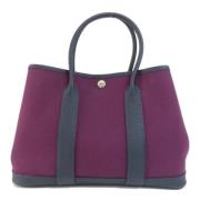 Pre-owned Canvas handbags Hermès Vintage , Purple , Dames