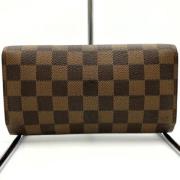 Pre-owned Canvas wallets Louis Vuitton Vintage , Brown , Dames