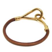 Pre-owned Metal bracelets Hermès Vintage , Brown , Dames