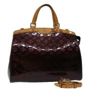 Pre-owned Leather handbags Louis Vuitton Vintage , Brown , Dames