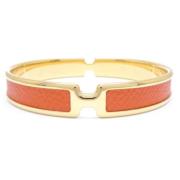 Pre-owned Metal bracelets Hermès Vintage , Orange , Dames