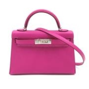 Pre-owned Leather handbags Hermès Vintage , Pink , Dames