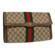 Pre-owned Leather clutches Gucci Vintage , Beige , Dames