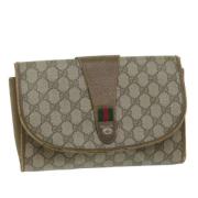 Pre-owned Leather clutches Gucci Vintage , Beige , Dames