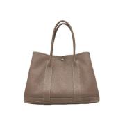 Pre-owned Leather handbags Hermès Vintage , Beige , Dames