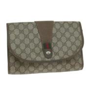 Pre-owned Canvas clutches Gucci Vintage , Beige , Dames