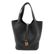 Pre-owned Leather handbags Hermès Vintage , Black , Dames