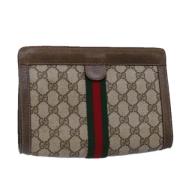 Pre-owned Leather clutches Gucci Vintage , Beige , Dames