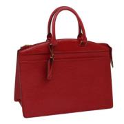 Pre-owned Leather handbags Louis Vuitton Vintage , Red , Dames