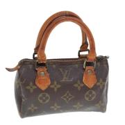 Pre-owned Canvas handbags Louis Vuitton Vintage , Brown , Dames