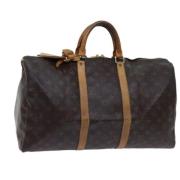 Pre-owned Canvas handbags Louis Vuitton Vintage , Brown , Dames