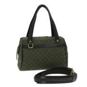 Pre-owned Canvas handbags Louis Vuitton Vintage , Green , Dames