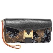 Pre-owned Leather clutches Louis Vuitton Vintage , Black , Dames