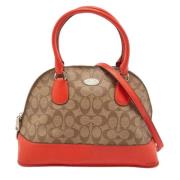 Pre-owned Coated canvas handbags Coach Pre-owned , Orange , Dames