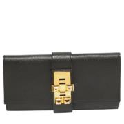 Pre-owned Leather clutches Hermès Vintage , Black , Dames