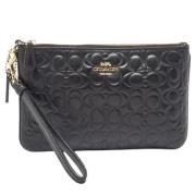 Pre-owned Leather clutches Coach Pre-owned , Black , Dames