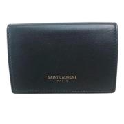 Pre-owned Leather wallets Yves Saint Laurent Vintage , Black , Dames