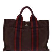 Pre-owned Canvas handbags Hermès Vintage , Red , Dames