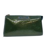 Pre-owned Leather pouches Louis Vuitton Vintage , Green , Dames