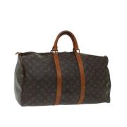 Pre-owned Coated canvas handbags Louis Vuitton Vintage , Brown , Dames