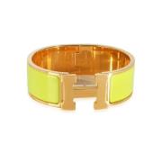 Pre-owned Metal bracelets Hermès Vintage , Yellow , Dames