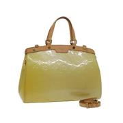 Pre-owned Leather handbags Louis Vuitton Vintage , Beige , Dames