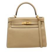 Pre-owned Leather handbags Hermès Vintage , Beige , Dames