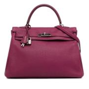 Pre-owned Leather handbags Hermès Vintage , Purple , Dames