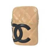 Pre-owned Leather clutches Chanel Vintage , Beige , Dames