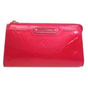 Pre-owned Leather clutches Louis Vuitton Vintage , Red , Dames