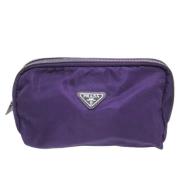 Pre-owned Fabric clutches Prada Vintage , Purple , Dames