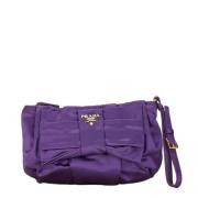 Pre-owned Fabric clutches Prada Vintage , Purple , Dames