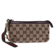 Pre-owned Canvas clutches Gucci Vintage , Beige , Dames